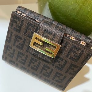 Small brown Fendi wallet.
